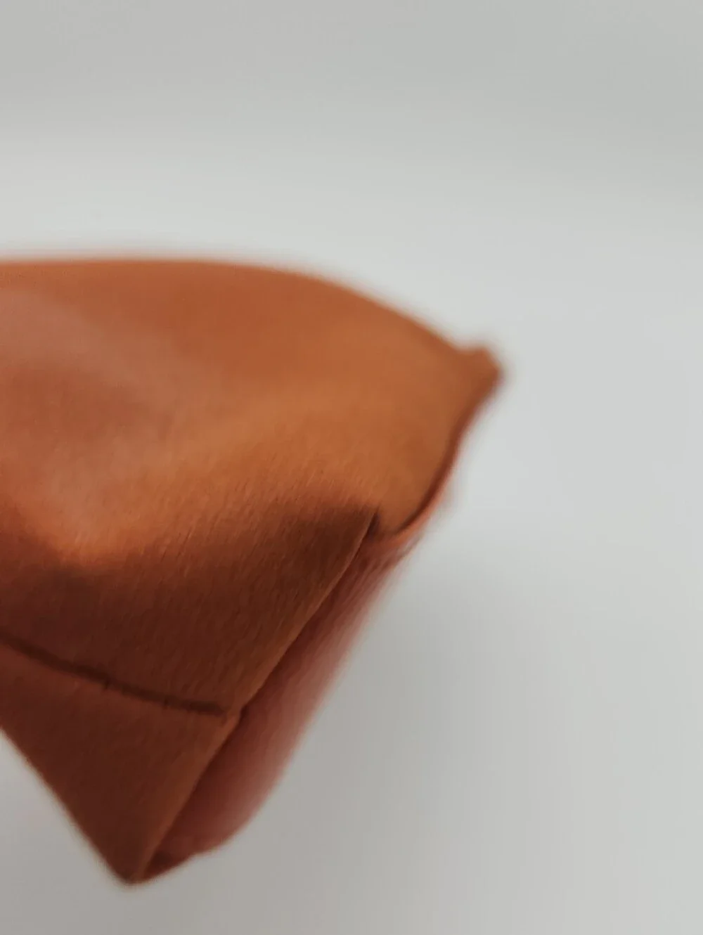 Estee Lauder Sleek Burnt Orange Zip Pouch with Gold Grommets